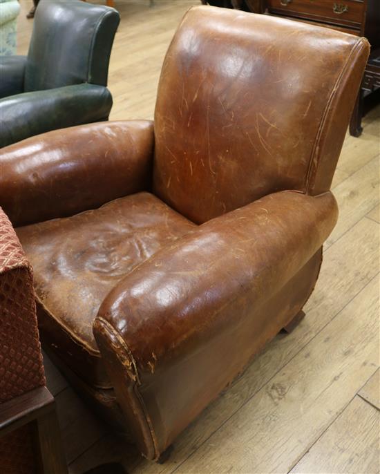 A 1930s French leather club armchair